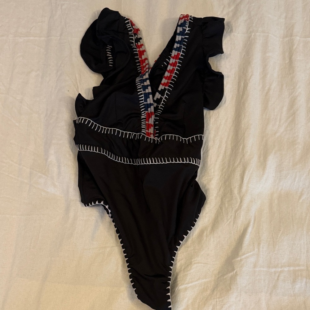 Stylish Black One-Piece Swimsuit with Red and Blue Accents